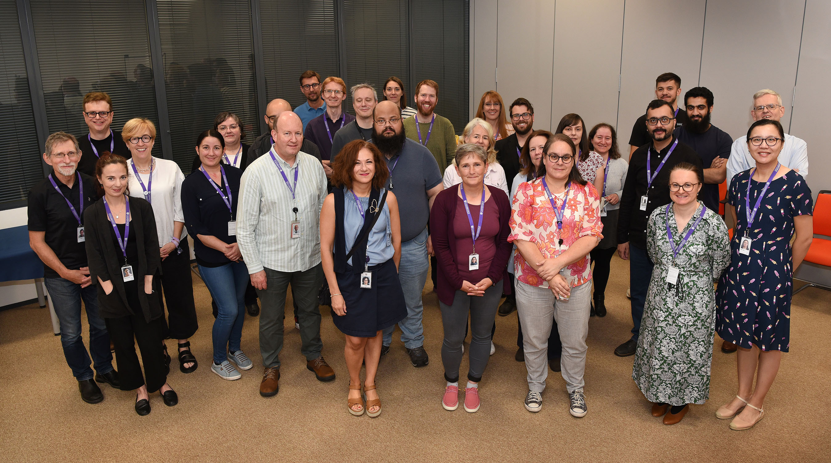 A group photo of attendees at the data apprentice celebration held at University Printing House.